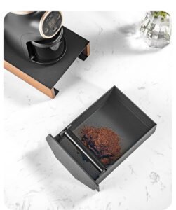 Coffee knock box with portafilter