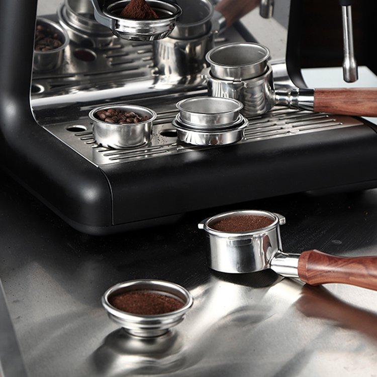 Various coffee filter baskets fitting different espresso machine portafilters